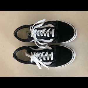 Black Vans.